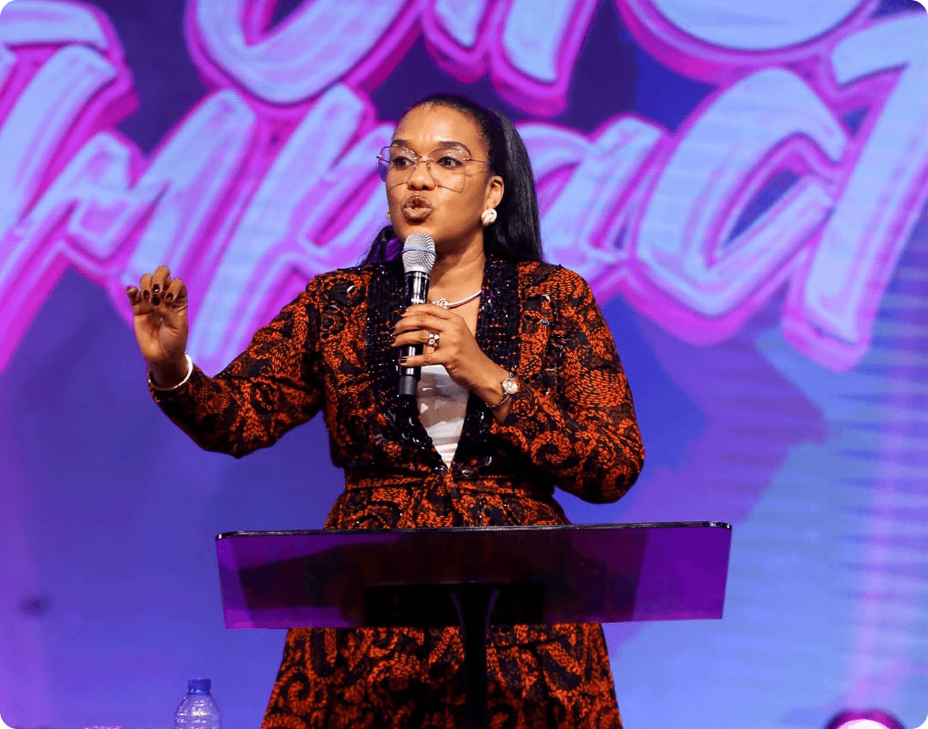 Rev Oyiks Alfred speaking at the pulpit